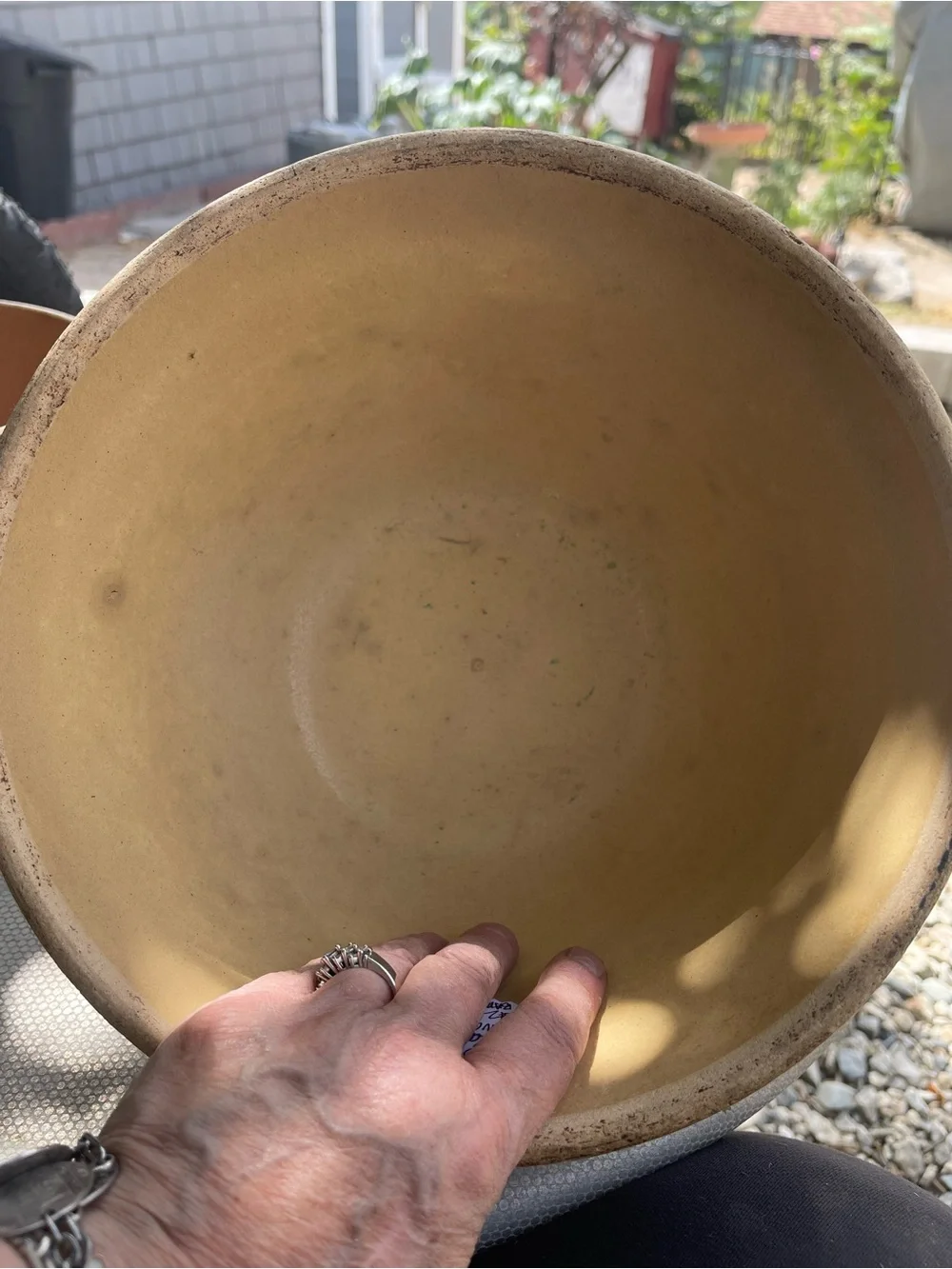 2-Antique Robinson Ransbottom girl w/watering can mixing bowls
